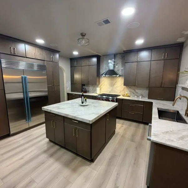 marble countertop island with range hood in a remodeled manalapan kitchen rrr0gl6e4p0mv4v1t2wg4z56mw921d50kw8gdsbu5s Marble countertop island with range hood in a remodeled Manalapan kitchen